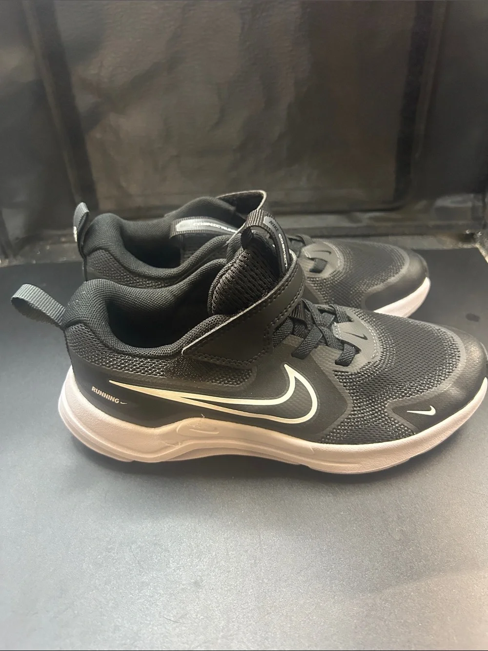 Nike Kids Black Sneakers with White Swoosh